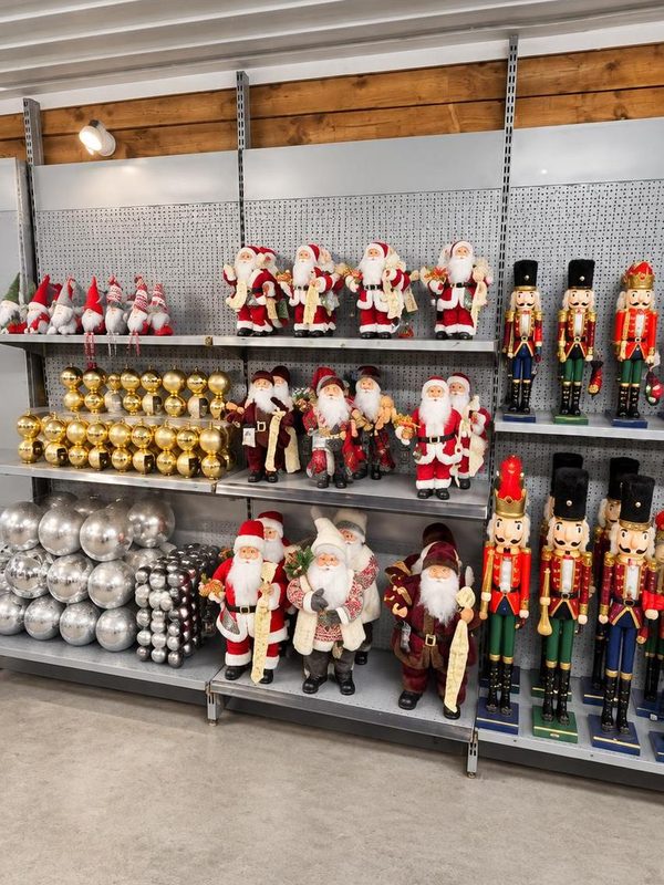 Santas, nutcrackers and decorations on shelves