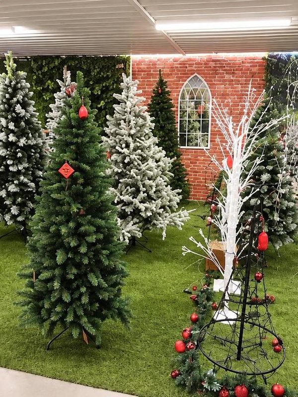 Artificial trees and light-up birch trees in store